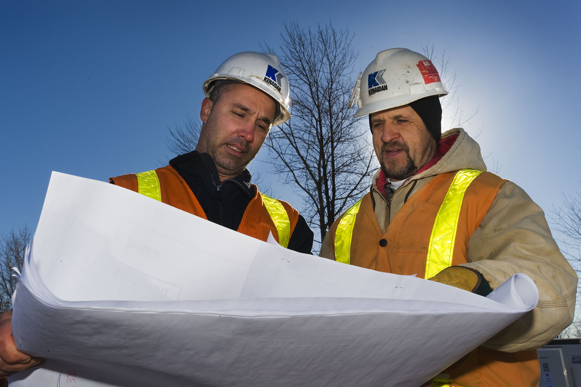Professional photograph of two construction contractors